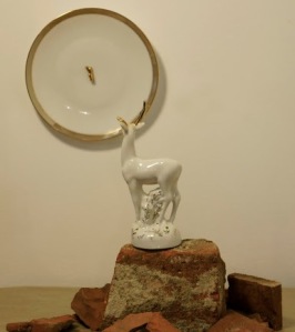 Bogdan Teodorescu's poignant chipped deer figurine looking at it's broken antler